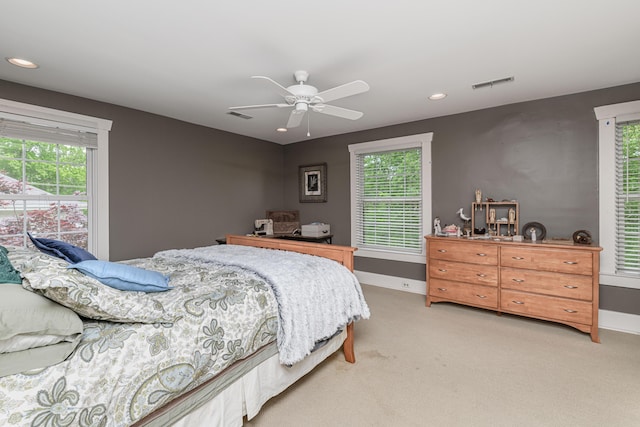 403 Westmount Ave, Columbia, MO 65203 - bedroom with light carpet, baseboards, multiple windows, and recessed lighting