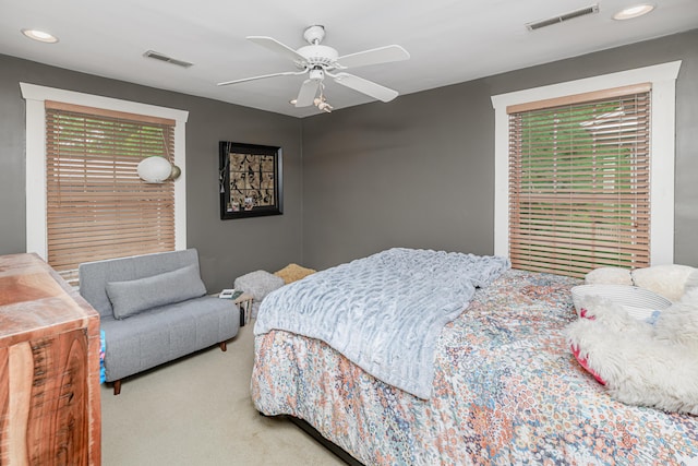 403 Westmount Ave, Columbia, MO 65203 - bedroom with multiple windows, a ceiling fan, carpet, and recessed lighting