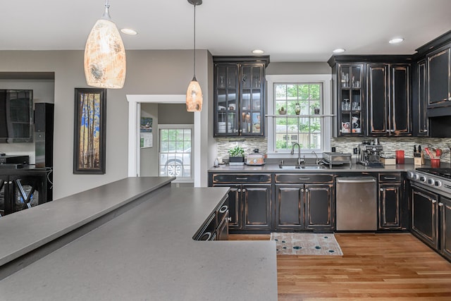 403 Westmount Ave, Columbia, MO 65203 - kitchen with a sink, dishwasher, healthy amount of natural light, light wood-style floors, and recessed lighting