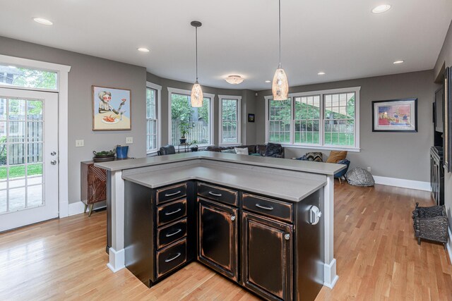 403 Westmount Ave, Columbia, MO 65203 - kitchen featuring light wood-style flooring, open floor plan, light countertops, healthy amount of natural light, and recessed lighting