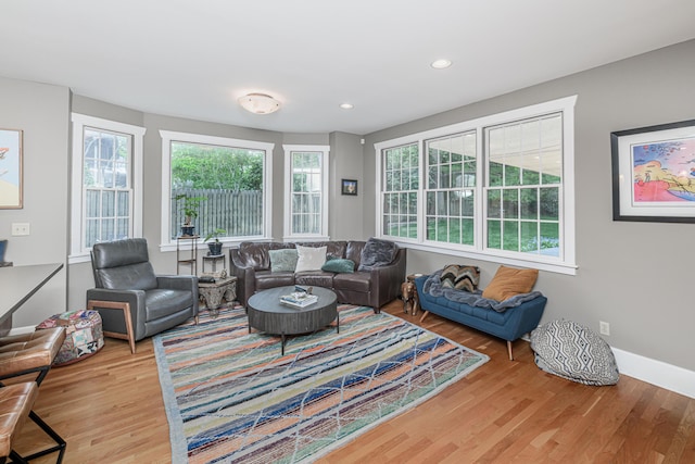 403 Westmount Ave, Columbia, MO 65203 - living room with healthy amount of natural light, wood finished floors, recessed lighting, and baseboards