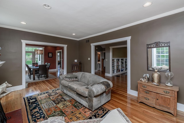 403 Westmount Ave, Columbia, MO 65203 - living area with healthy amount of natural light, light wood-style flooring, baseboards, ornamental molding, and recessed lighting