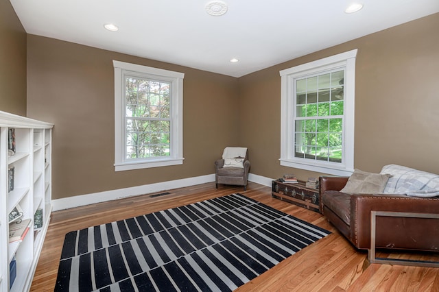 403 Westmount Ave, Columbia, MO 65203 - living area with wood finished floors, baseboards, and recessed lighting