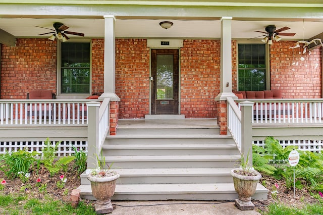403 Westmount Ave, Columbia, MO 65203 - entrance to property with ceiling fan, covered porch, and brick siding