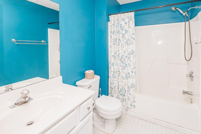 4983 N Montgomery Dr, Columbia, MO 65202 - bathroom with vanity, shower / tub combo, toilet, and tile patterned floors