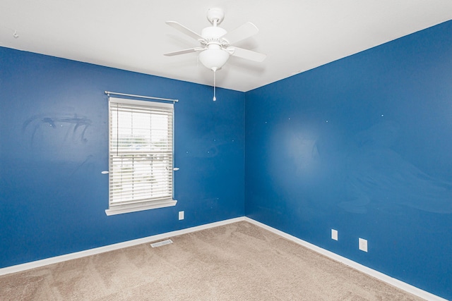 4983 N Montgomery Dr, Columbia, MO 65202 - carpeted spare room featuring ceiling fan and baseboards