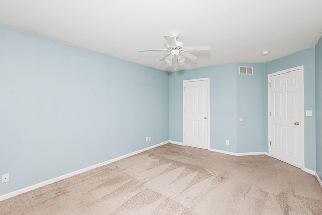 4983 N Montgomery Dr, Columbia, MO 65202 - unfurnished bedroom featuring carpet flooring, baseboards, ceiling fan, and a closet