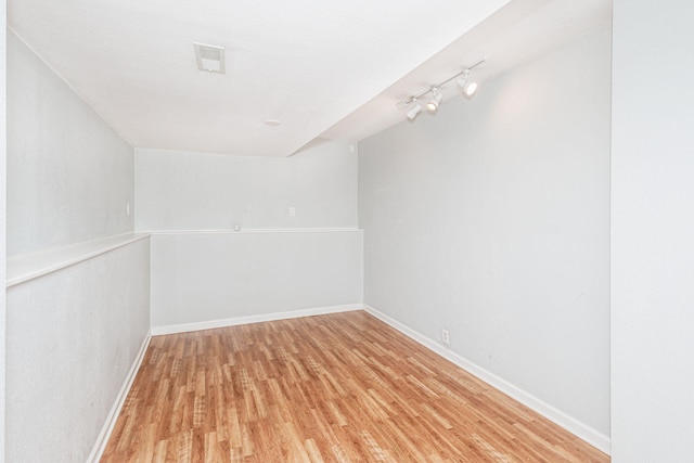 4983 N Montgomery Dr, Columbia, MO 65202 - spare room with light wood-style flooring, baseboards, and track lighting