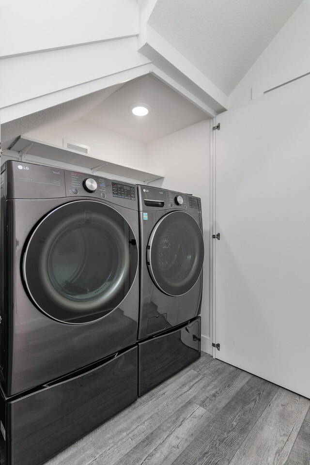 424 Angels Rest Way, Columbia, MO 65203 - laundry area featuring independent washer and dryer and wood finished floors