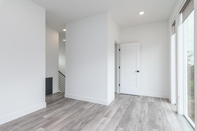 424 Angels Rest Way, Columbia, MO 65203 - unfurnished living room featuring light wood-style floors, recessed lighting, and baseboards