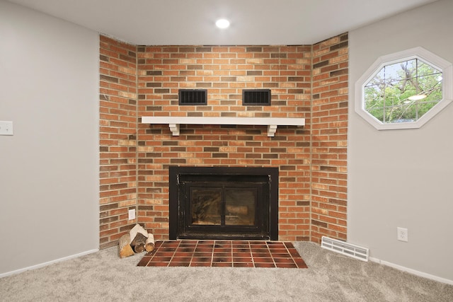 1419 Rosebud St, Mexico, MO 65265 - details with visible vents, carpet flooring, and a fireplace