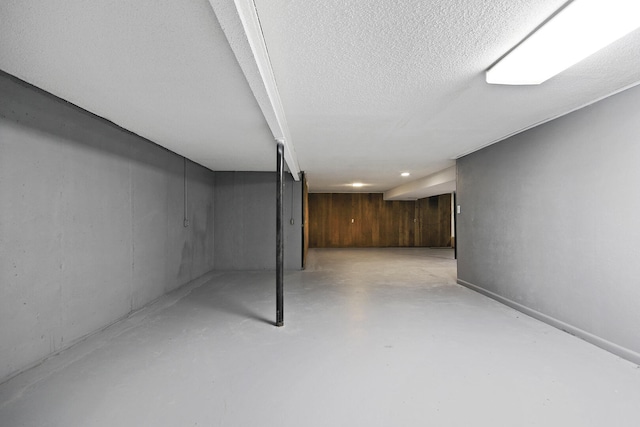 1419 Rosebud St, Mexico, MO 65265 - finished below grade area with a textured ceiling