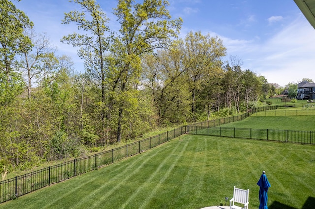 view of yard with fence