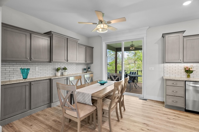 dining room with light wood-style floors, a ceiling fan, baseboards, recessed lighting, and visible vents