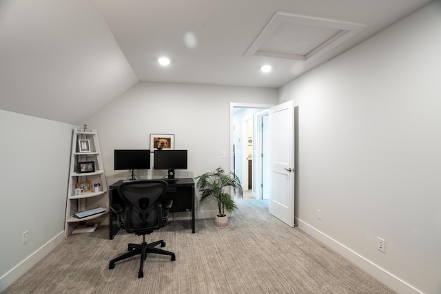 home office with carpet floors, baseboards, and attic access