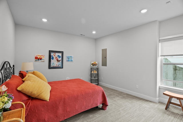 carpeted bedroom featuring baseboards, electric panel, recessed lighting, and visible vents