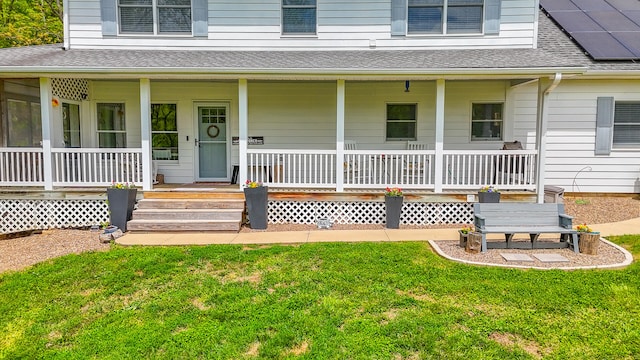 7751 W Old Barclay Creek Ln, Columbia, MO 65202 - property entrance featuring a porch, a shingled roof, and a yard