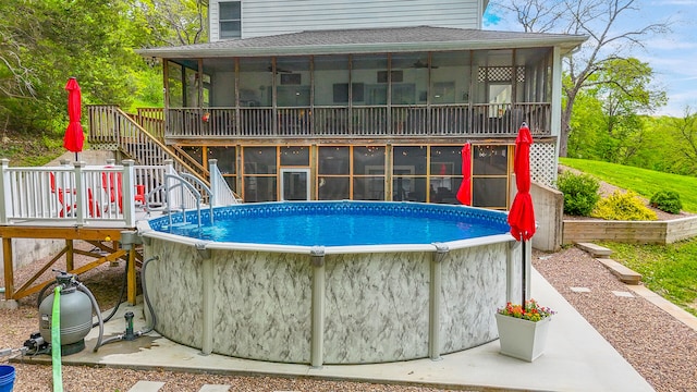 7751 W Old Barclay Creek Ln, Columbia, MO 65202 - swimming pool featuring a sunroom, stairs, and a deck