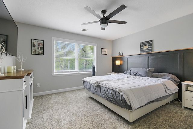 7751 W Old Barclay Creek Ln, Columbia, MO 65202 - carpeted bedroom with baseboards and ceiling fan
