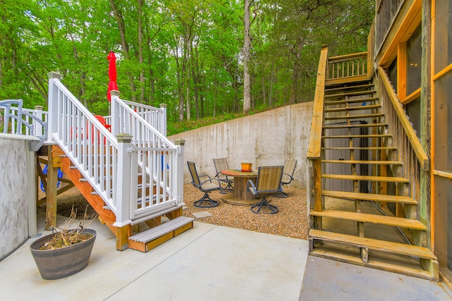 7751 W Old Barclay Creek Ln, Columbia, MO 65202 - view of patio / terrace with stairway