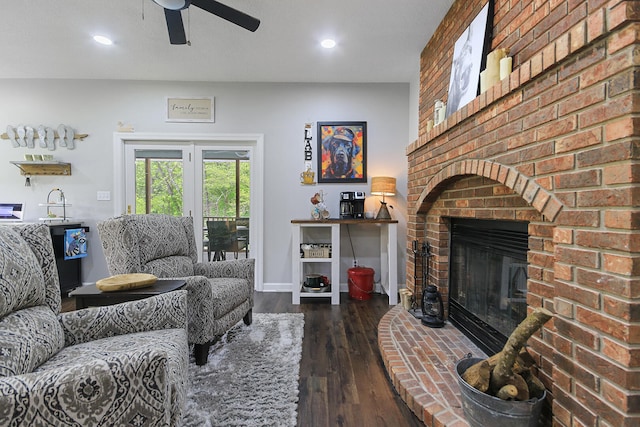7751 W Old Barclay Creek Ln, Columbia, MO 65202 - living room with a brick fireplace, ceiling fan, wood finished floors, recessed lighting, and baseboards