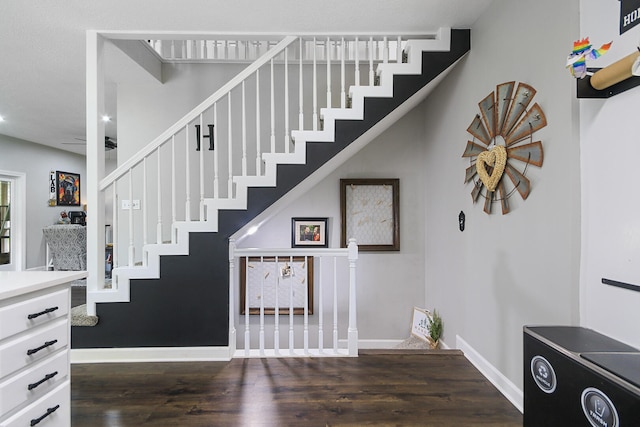 7751 W Old Barclay Creek Ln, Columbia, MO 65202 - stairs with wood finished floors, baseboards, and recessed lighting