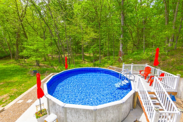 7751 W Old Barclay Creek Ln, Columbia, MO 65202 - swimming pool with a deck