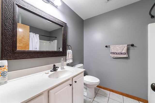 12421 Lang Rd, Boonville, MO 65233 - full bath with tile patterned flooring, toilet, vanity, curtained shower, and baseboards