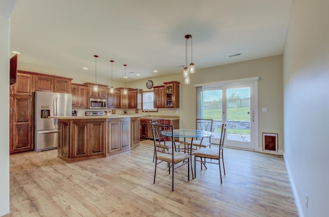 1600 Andretti Cir, Columbia, MO 65201 - dining area featuring light wood finished floors, baseboards, and recessed lighting