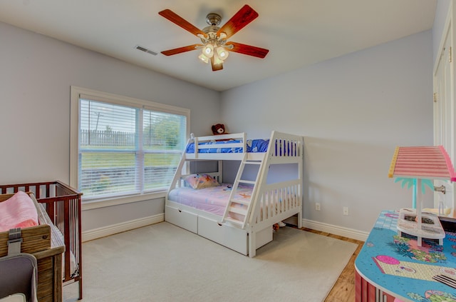 1600 Andretti Cir, Columbia, MO 65201 - bedroom with baseboards and a ceiling fan
