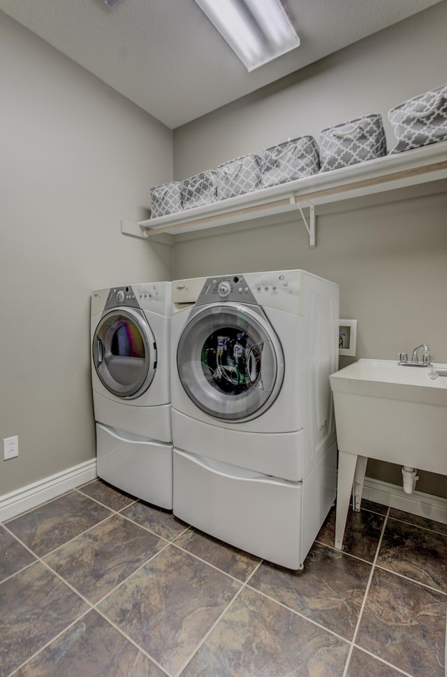 1600 Andretti Cir, Columbia, MO 65201 - laundry area with washer and dryer and baseboards