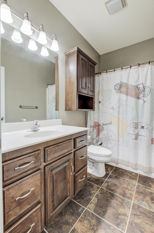 1600 Andretti Cir, Columbia, MO 65201 - full bath with vanity, toilet, and stone finish flooring