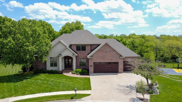 6507 Crooked Switch Ct, Columbia, MO 65201 - traditional-style house with brick siding, concrete driveway, a front lawn, and an attached garage