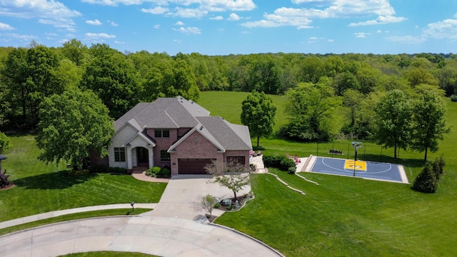 6507 Crooked Switch Ct, Columbia, MO 65201 - aerial view of property and surrounding area featuring a heavily wooded area