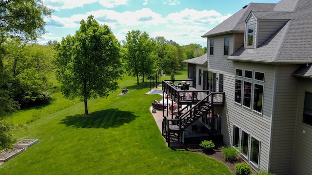 6507 Crooked Switch Ct, Columbia, MO 65201 - view of grassy yard with stairway and a wooden deck