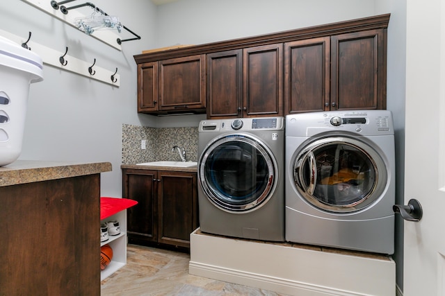 6507 Crooked Switch Ct, Columbia, MO 65201 - laundry area with cabinet space and washing machine and dryer