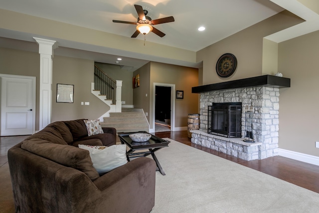 6507 Crooked Switch Ct, Columbia, MO 65201 - living room with ceiling fan, baseboards, stairs, a fireplace, and wood finished floors