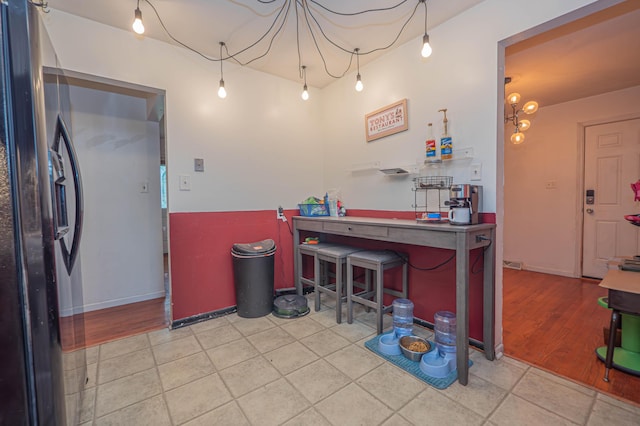 interior space featuring black fridge