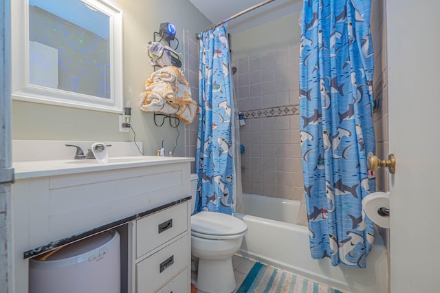bathroom featuring shower / bath combo with shower curtain, tile patterned flooring, toilet, and vanity