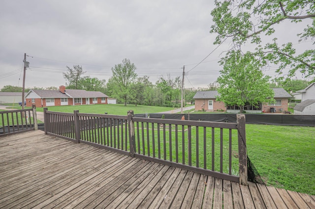 deck featuring a lawn