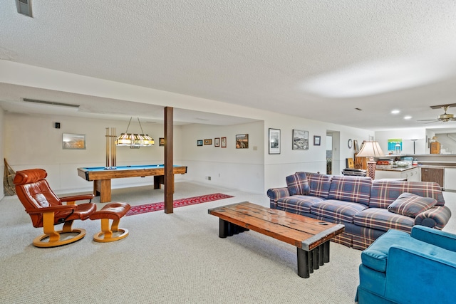 living area with billiards, carpet, a ceiling fan, and a textured ceiling