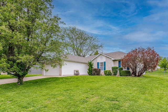 ranch-style house with a shingled roof, brick siding, a garage, a front yard, and driveway