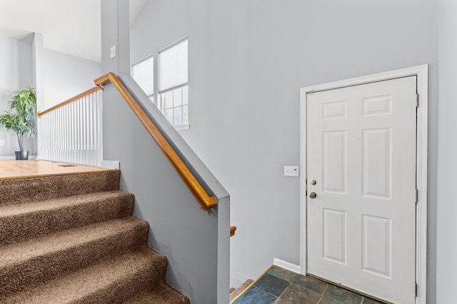 5650 N Autumn Dr, Columbia, MO 65202 - staircase featuring baseboards