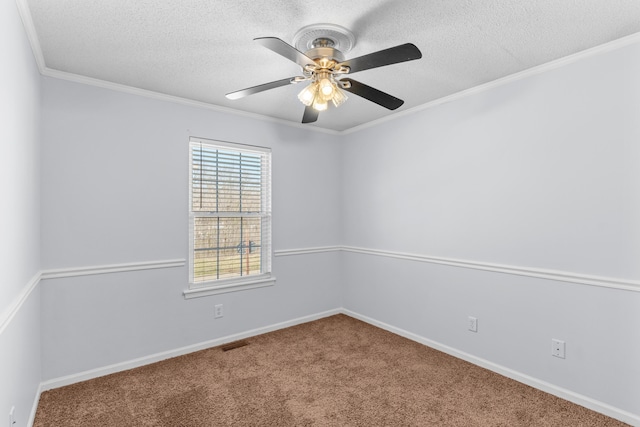 5650 N Autumn Dr, Columbia, MO 65202 - carpeted empty room featuring baseboards, ceiling fan, ornamental molding, and a textured ceiling