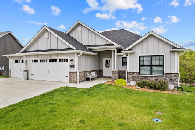 craftsman house featuring a front lawn, roof with shingles, board and batten siding, an attached garage, and driveway