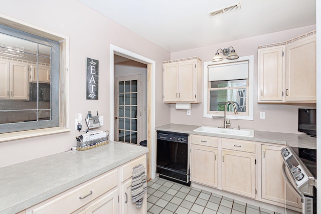 3005 Meghann Dr, Columbia, MO 65203 - kitchen with visible vents, dishwasher, a sink, light countertops, and stainless steel electric stove
