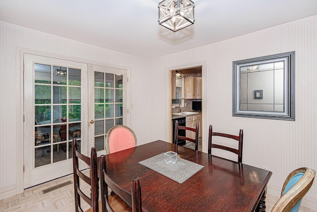 3005 Meghann Dr, Columbia, MO 65203 - dining space featuring visible vents, wine cooler, and wallpapered walls