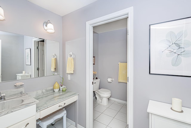 3005 Meghann Dr, Columbia, MO 65203 - bathroom with vanity, baseboards, tile patterned floors, and toilet