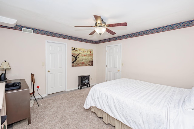 3005 Meghann Dr, Columbia, MO 65203 - bedroom featuring visible vents, baseboards, ceiling fan, and light carpet