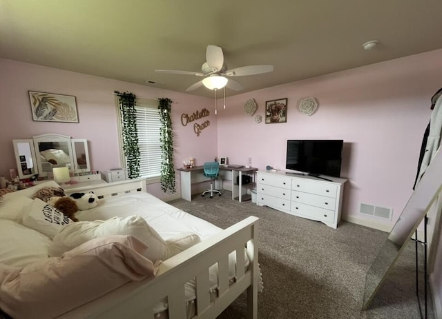 carpeted bedroom with ceiling fan and visible vents